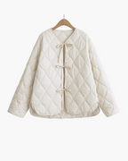 Quilted Jacket with Front Bow Ties and Round Neck - White